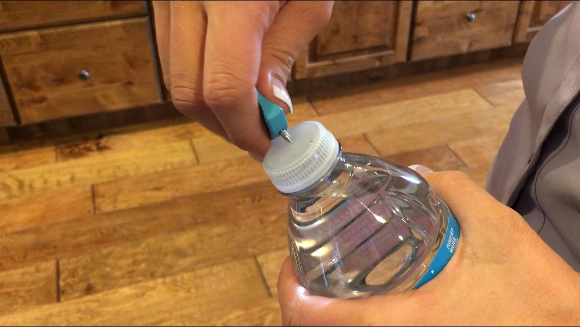 Sippy Poke -Turn a bottle of water into a “sippy”!