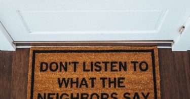 Don’t Listen To The Neighbors Brown Coir Doormat