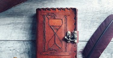 In The Eleventh Hour Hourglass Mini Leather Journal