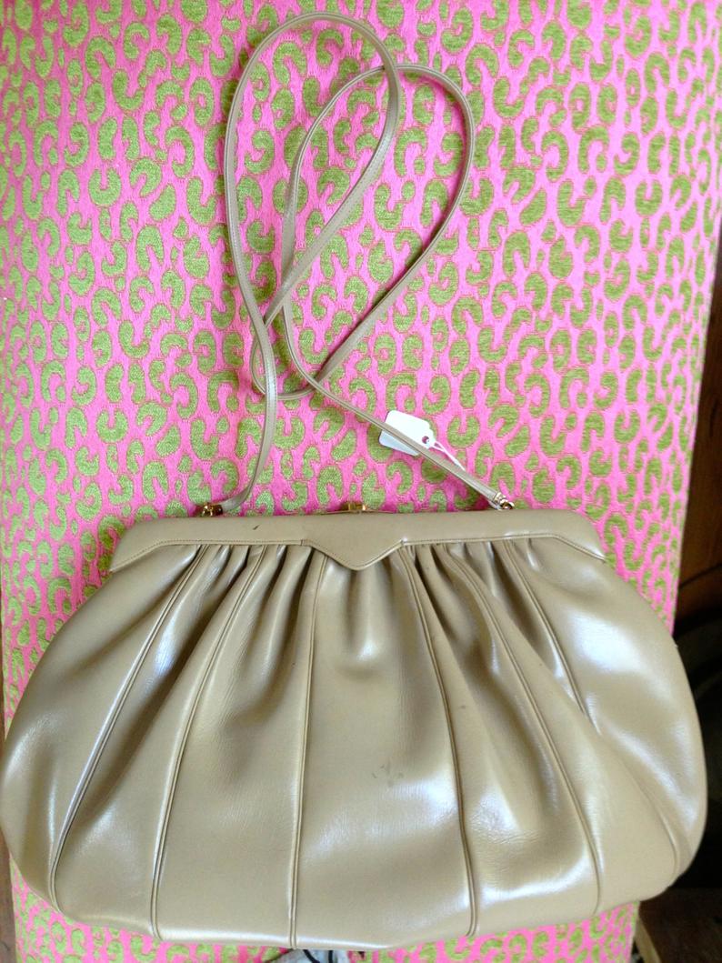 Judith Lieber handbad/clutch in light tan leather and tiger