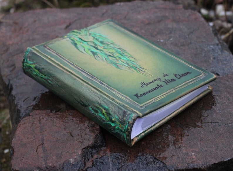 Leather photo album 10 x 7 1/2  with embossed green leaves for
