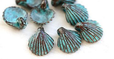 Small shell charms Green patina seashell beads Copper shell