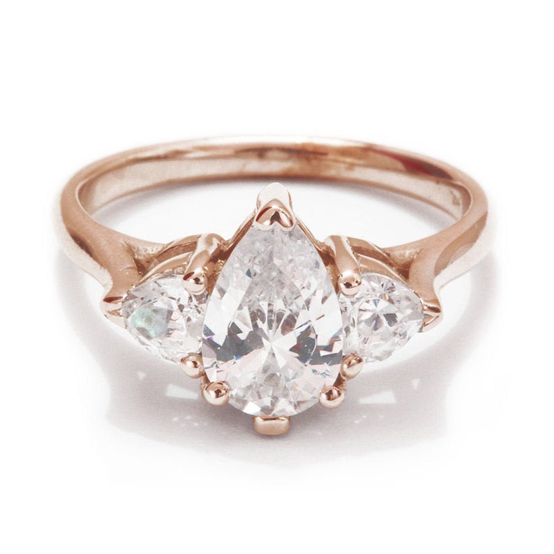 Unique Three Stone Moissanite Engagement Ring Pear Shaped