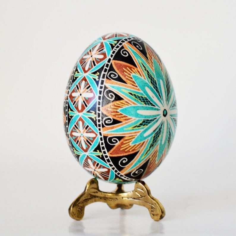 Hand painted Ukrainian Pysanky Easter art eggs turquoise blue