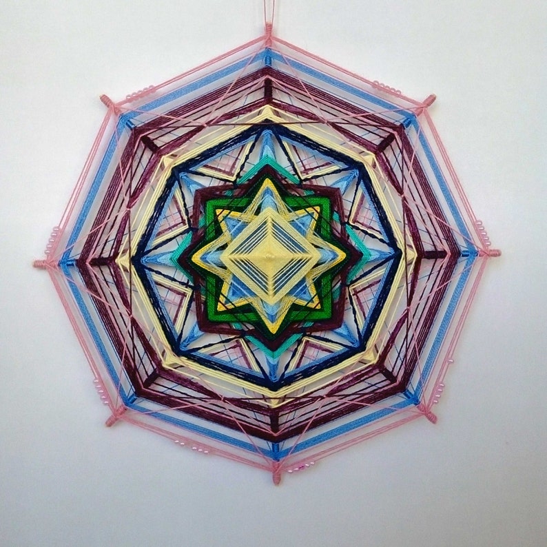 Artisan yarn mandala_handmade woven yarn mandala_ojo de
