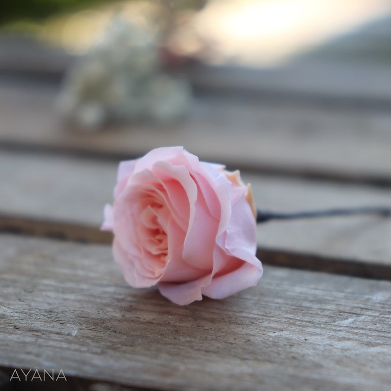 Mini stabilized rose on peak bridal hairstyle peak natural