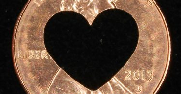 Lucky penny with heart cut out